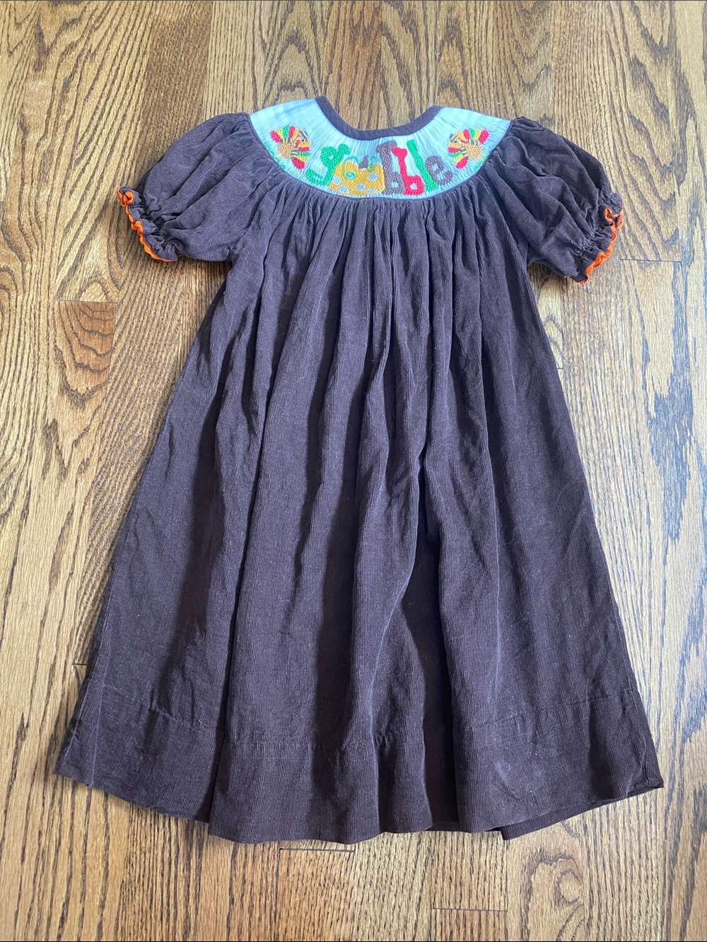 Girls' brown corduroy Pleats and Stitches smocked Thanksgiving bishop dress. 2T